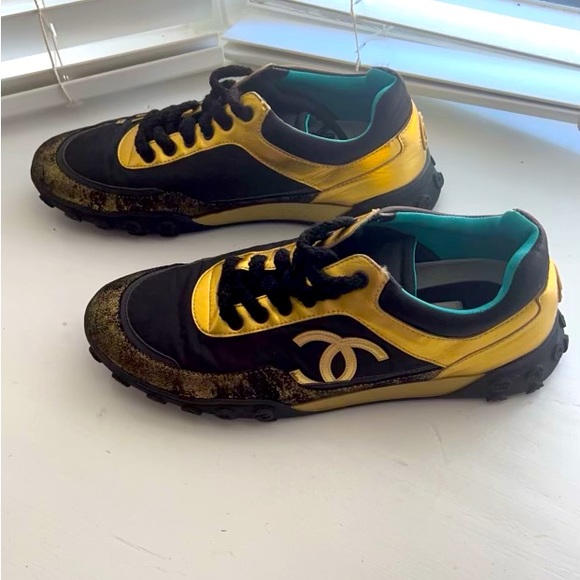 CHANEL Shoes Black And Gold Chanel Tennis Shoes Poshmark